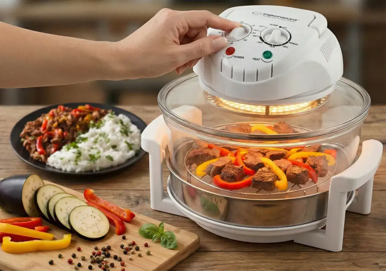 Kombiwar co to? Urządzenie do pieczenia mięsa z warzywami i ryżem. Ręka ustawia temperaturę.