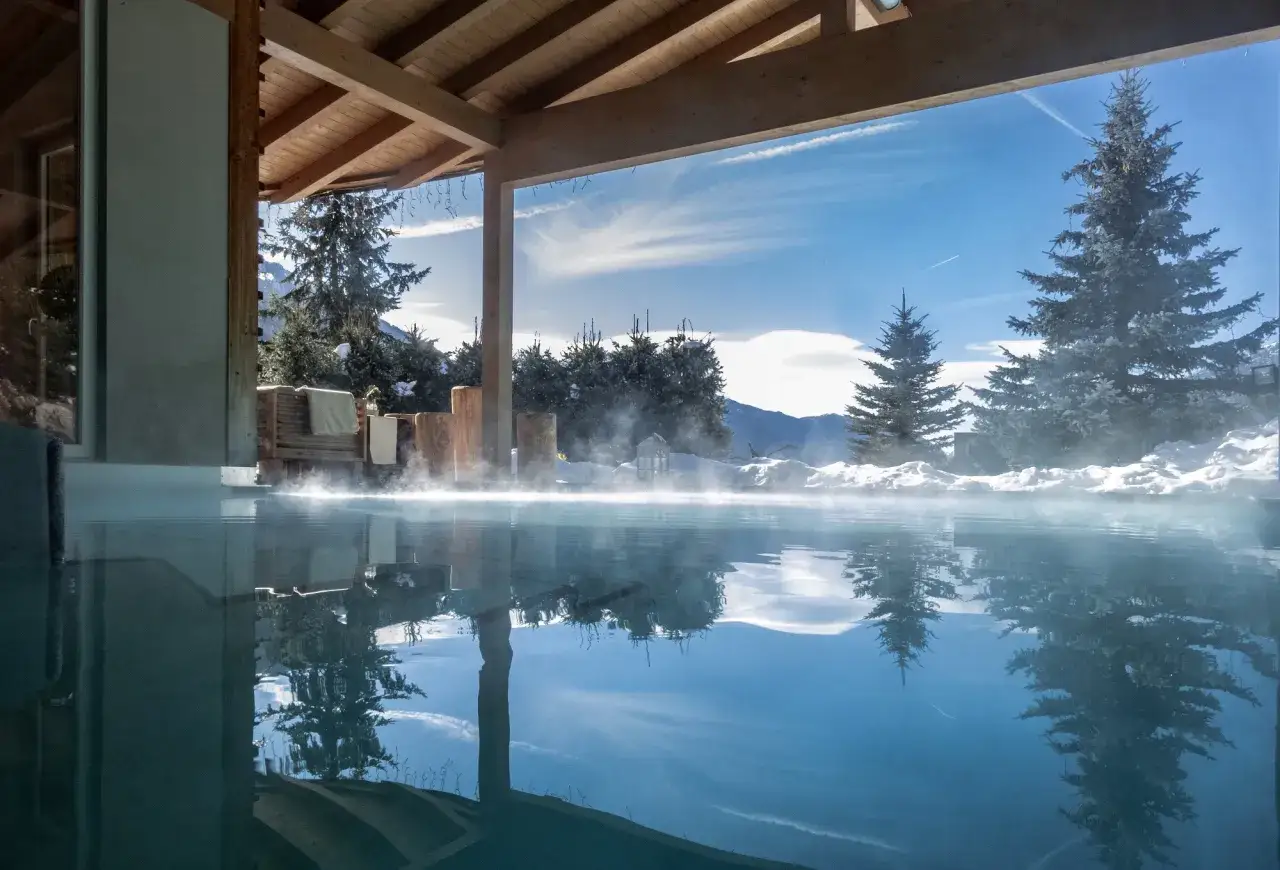 Olympic Spa Hotel Te Jaga sauna immersione piscina esterna vista Dolomiti