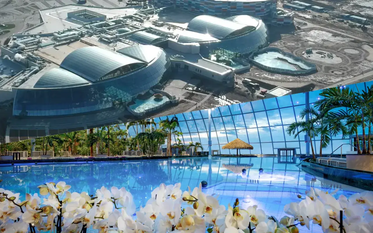 Widok z lotu ptaka na kompleks basenów i tropikalny basen z palmami. Zastanawiasz się, ile kosztuje pobyt w Suntago?