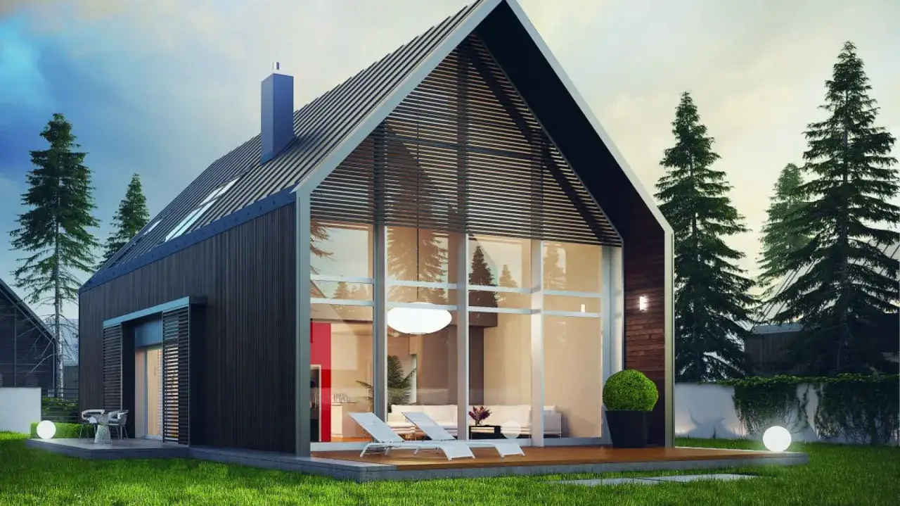 Nowoczesny dom z dużymi przeszkleniami i drewnianą elewacją, idealny przykład udanej modernizacji domu.