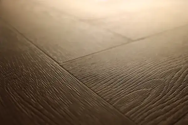 zbliżenie na różne rodzaje podłóg drewniana panele winyl płytki
