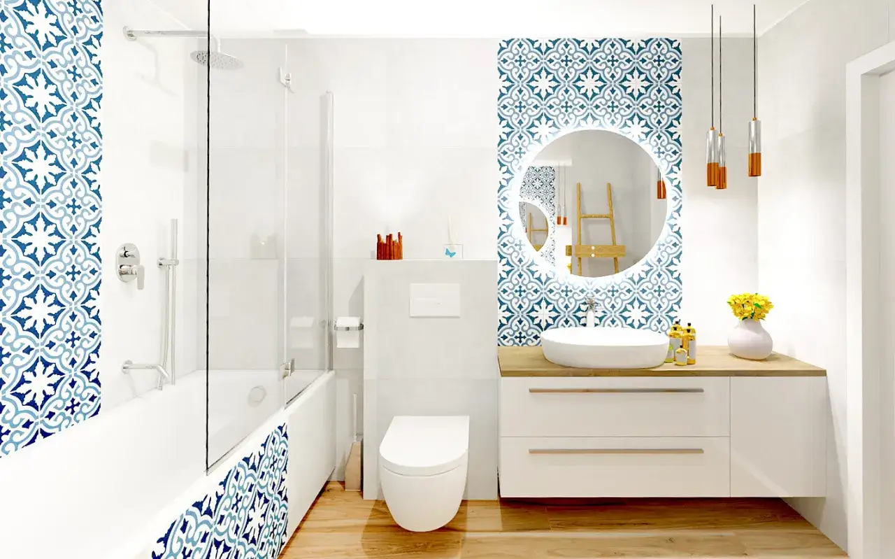 Jasna, nowoczesna łazienka w stylu skandynawskim z niebiesko-białymi płytkami, wanną, prysznicem i umywalką na drewnianym blacie.