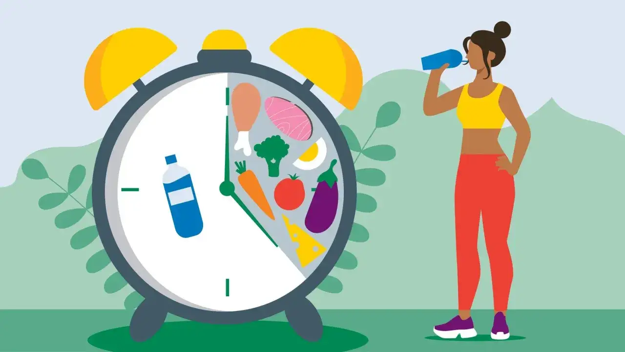 Zegar z jedzeniem i napojem symbolizuje zdrowe nawyki. Post wodny efekty są kluczowe dla dobrego samopoczucia.