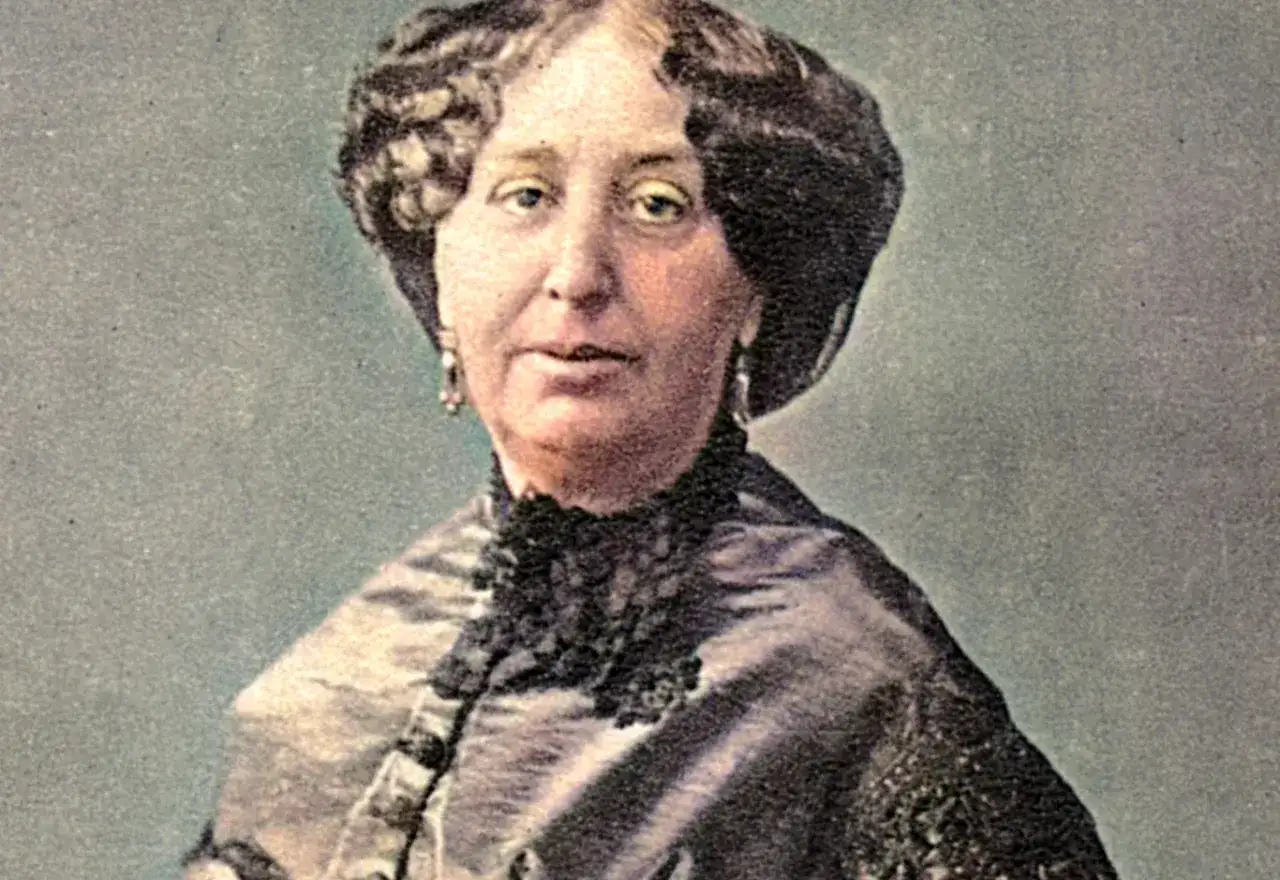 Portret George Sand, autorki wielu wspaniałych książek, w eleganckiej sukni i biżuterii.