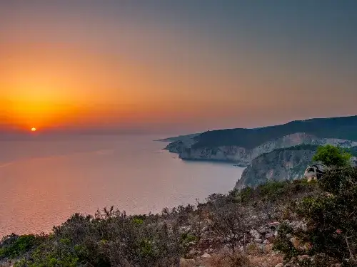 Klify Keri Mizithres zach&oacute;d słońca Zakynthos