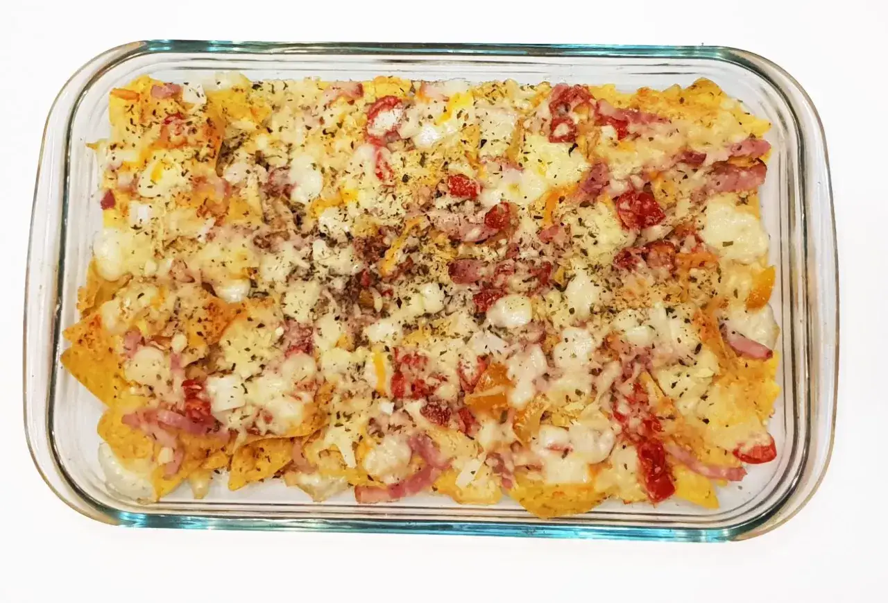 Zdjęcie &iquest;Nachos con queso al horno? Logra el fundido y crujido ideal.