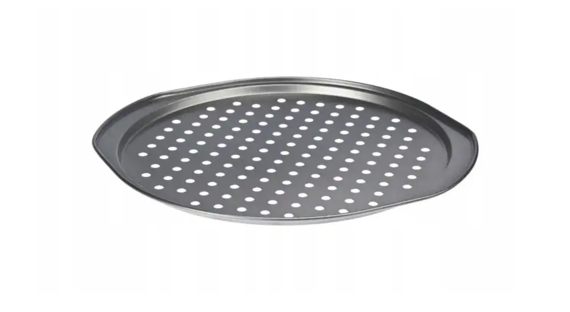 Zdjęcie Blacha do pizzy z dziurkami czy bez - jaki wybór zapewni lepszy smak?