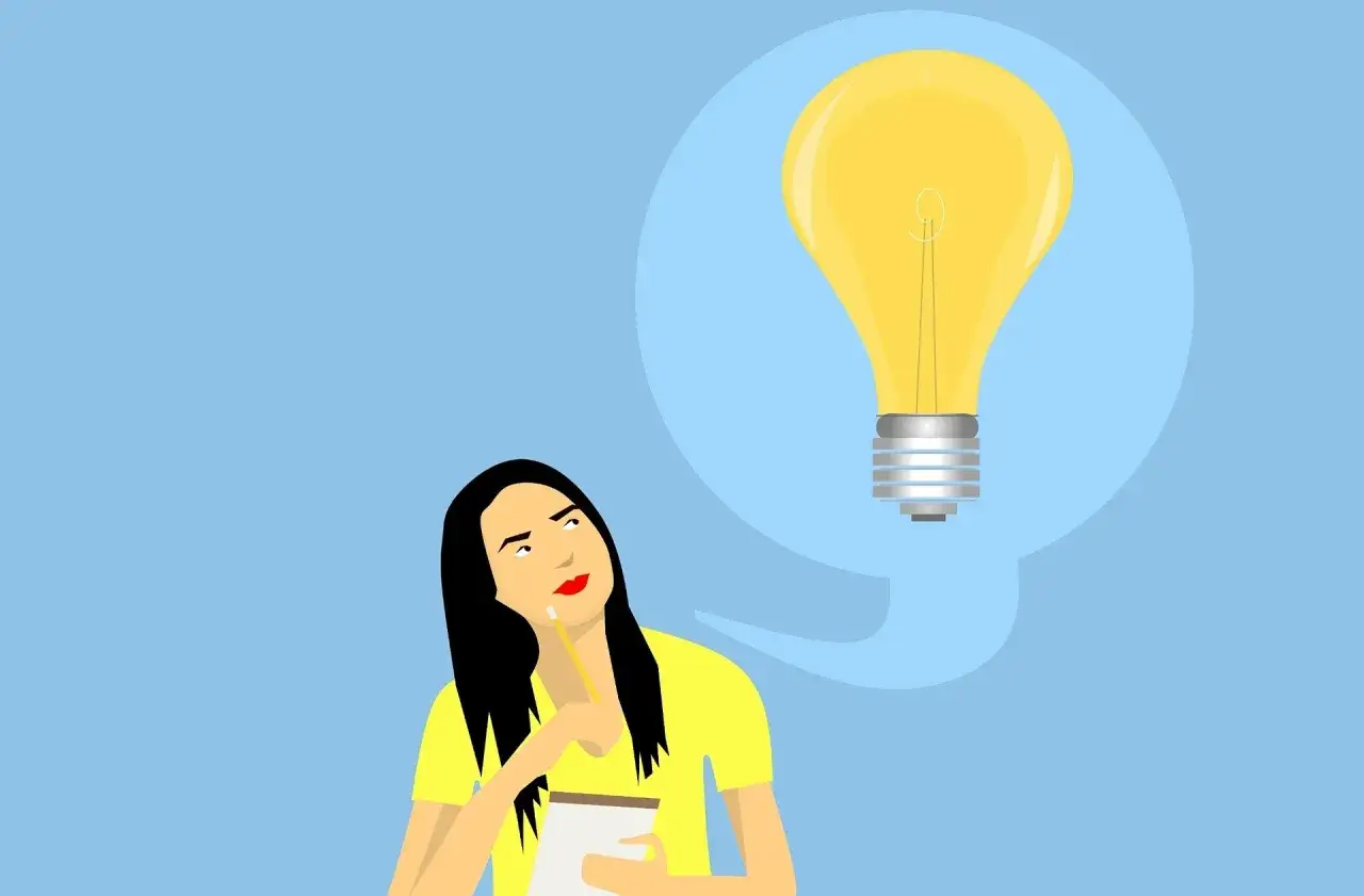 pedagog szkolny uśmiechnięty w gabinecie z dzieckiem