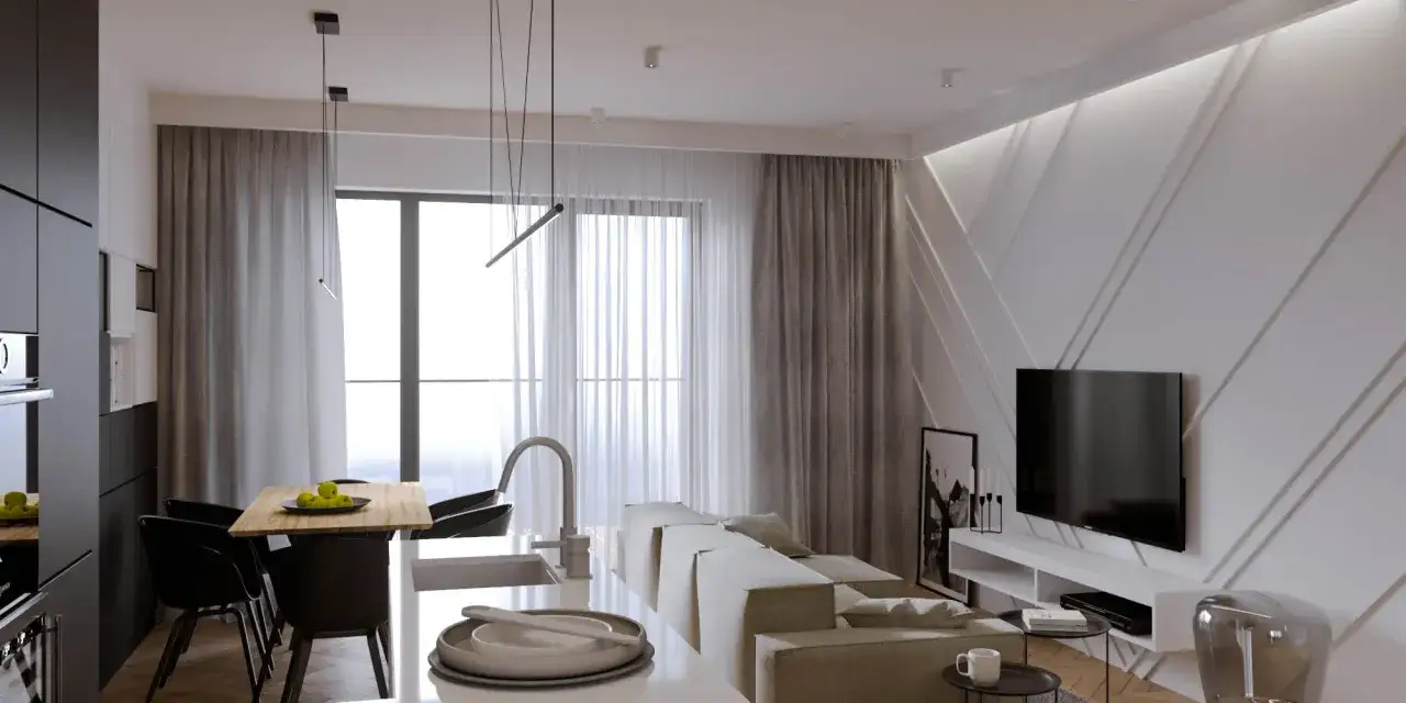 Nowoczesny salon z aneksem kuchennym. W centralnym punkcie wisi elegancki, minimalistyczny pasek pod sufitem, oświetlający stół jadalniany.