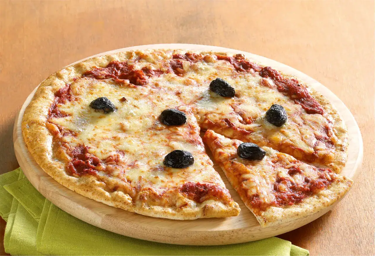 Pizza 3 fromages cuite au four