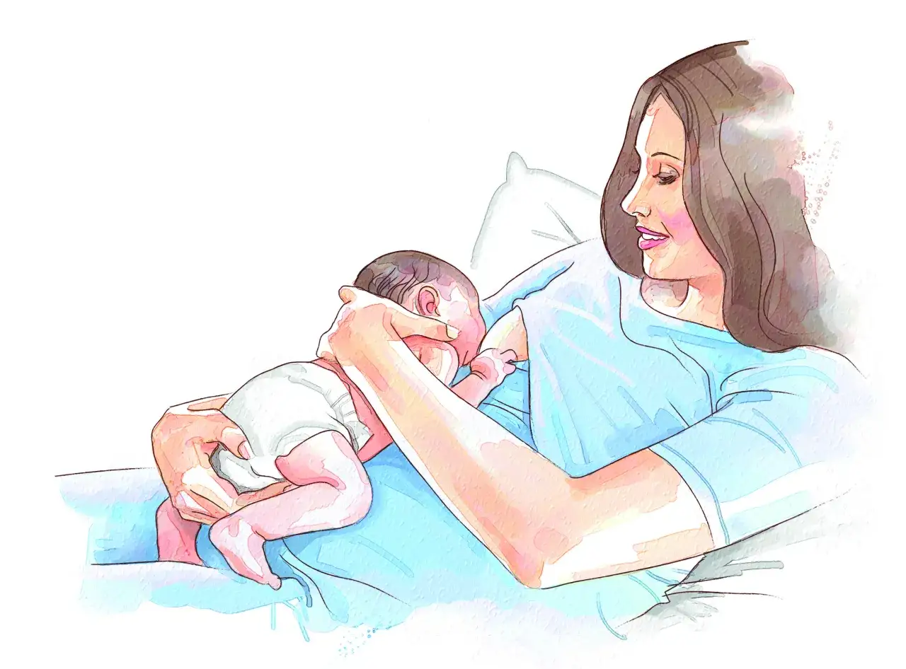 Matka karmi piersią dziecko w pozycji klasycznej.