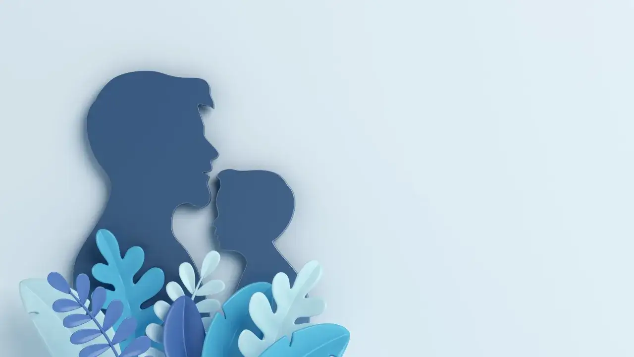 Sylwetki ojca i dziecka, otoczone niebieskimi liśćmi. Idealne na Dzień Ojca w Niemczech.