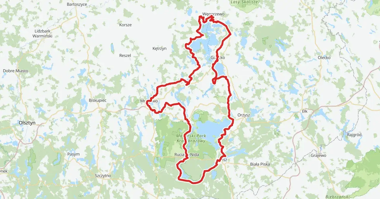 Mapa z zaznaczonymi trasami rowerowymi na Mazurach, wiodącymi przez malownicze jeziora i lasy, w okolicach Węgorzewa i Rucianego-Nidy.