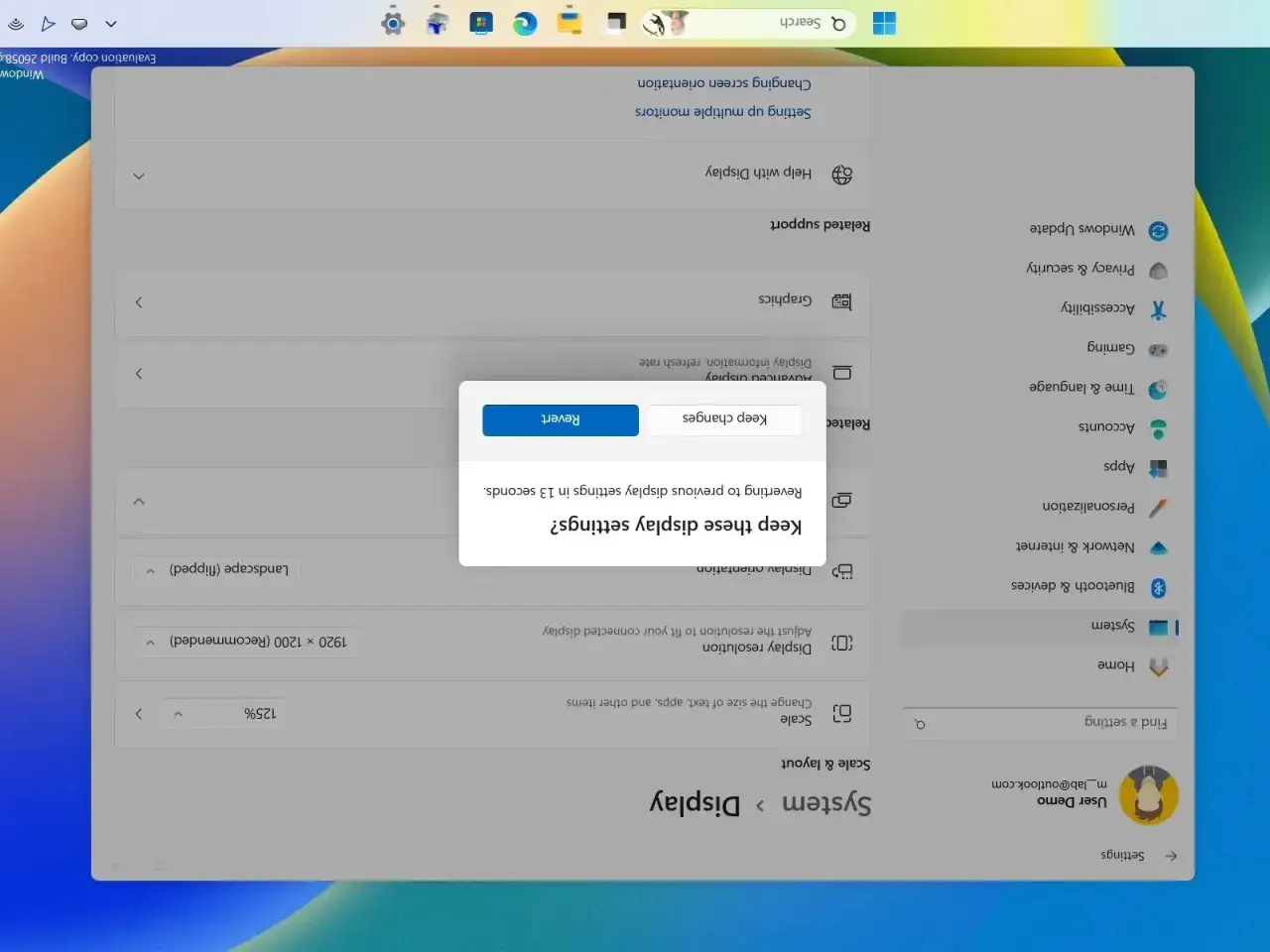 Ustawienia ekranu Windows: czy zachować zmiany po obracaniu ekranu? Okno dialogowe pyta o potwierdzenie.