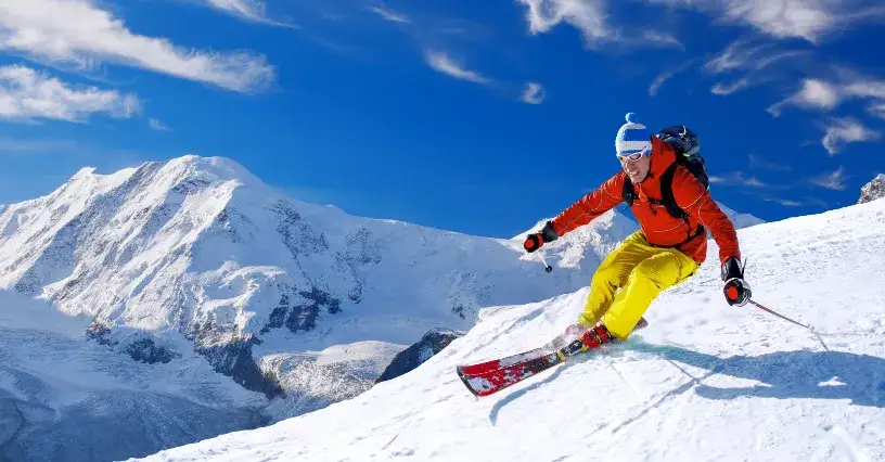 narciarz freeride kr&oacute;tkie kije narciarz slalom gigant długie kije