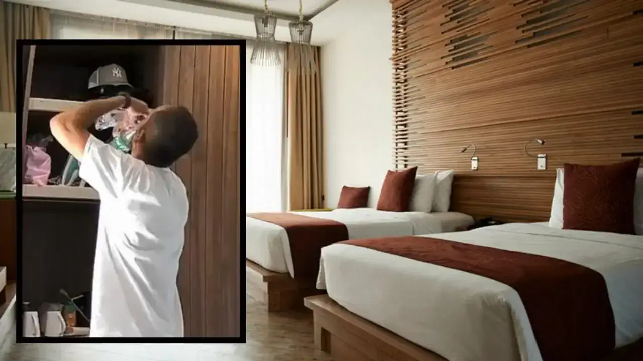 osoba dyskretnie fotografująca szczegóły w pokoju hotelowym