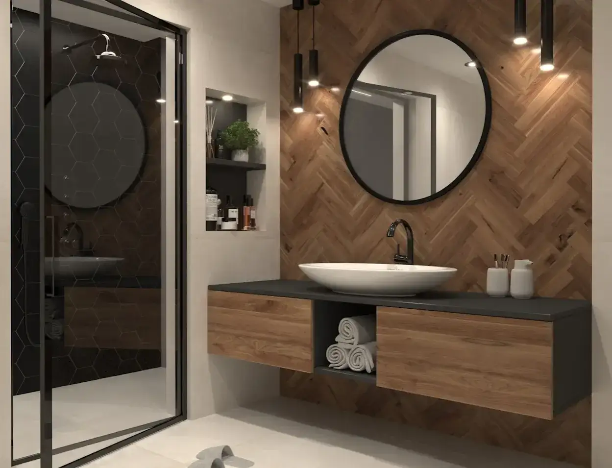Nowoczesna łazienka z drewnianą ścianą w jodełkę, umywalką nablatową i okrągłym lustrem. Oświetlenie okrągłego lustra podkreśla jego kształt.