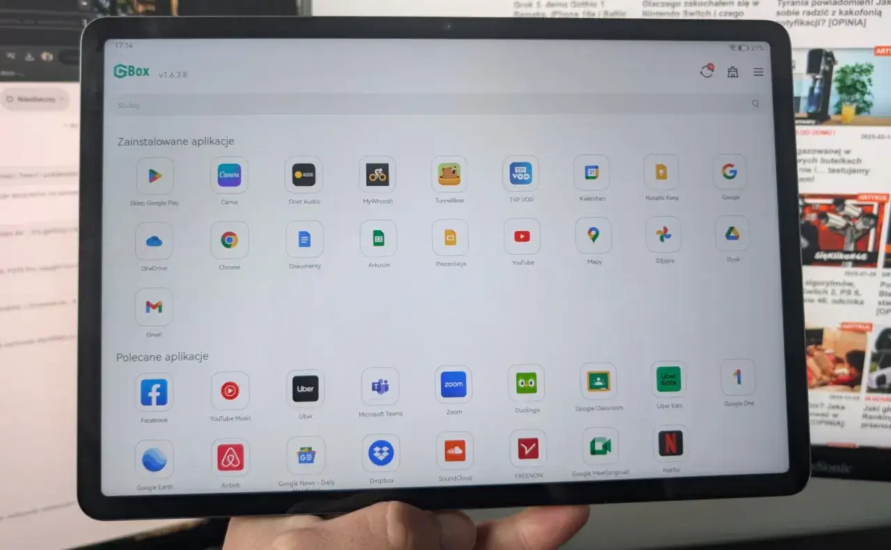 Ekran tabletu z aplikacjami, w tym Sklep Google Play, Canva, Onet Audio, Gmail, Facebook, Uber, Zoom. Widać też ikonę GBox, która może być powiązana z HMS Core.