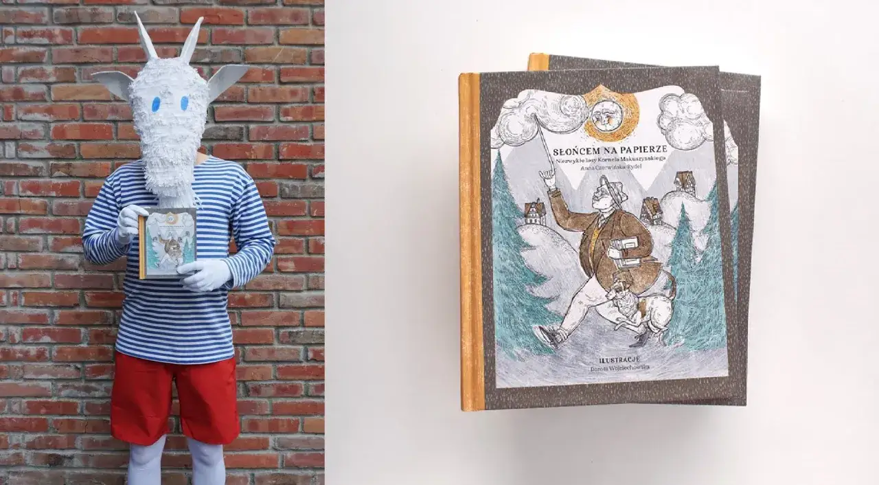 Osoba w stroju kozy trzyma książkę z ilustracją nawiązującą do utwor&oacute;w Kornela Makuszyńskiego.