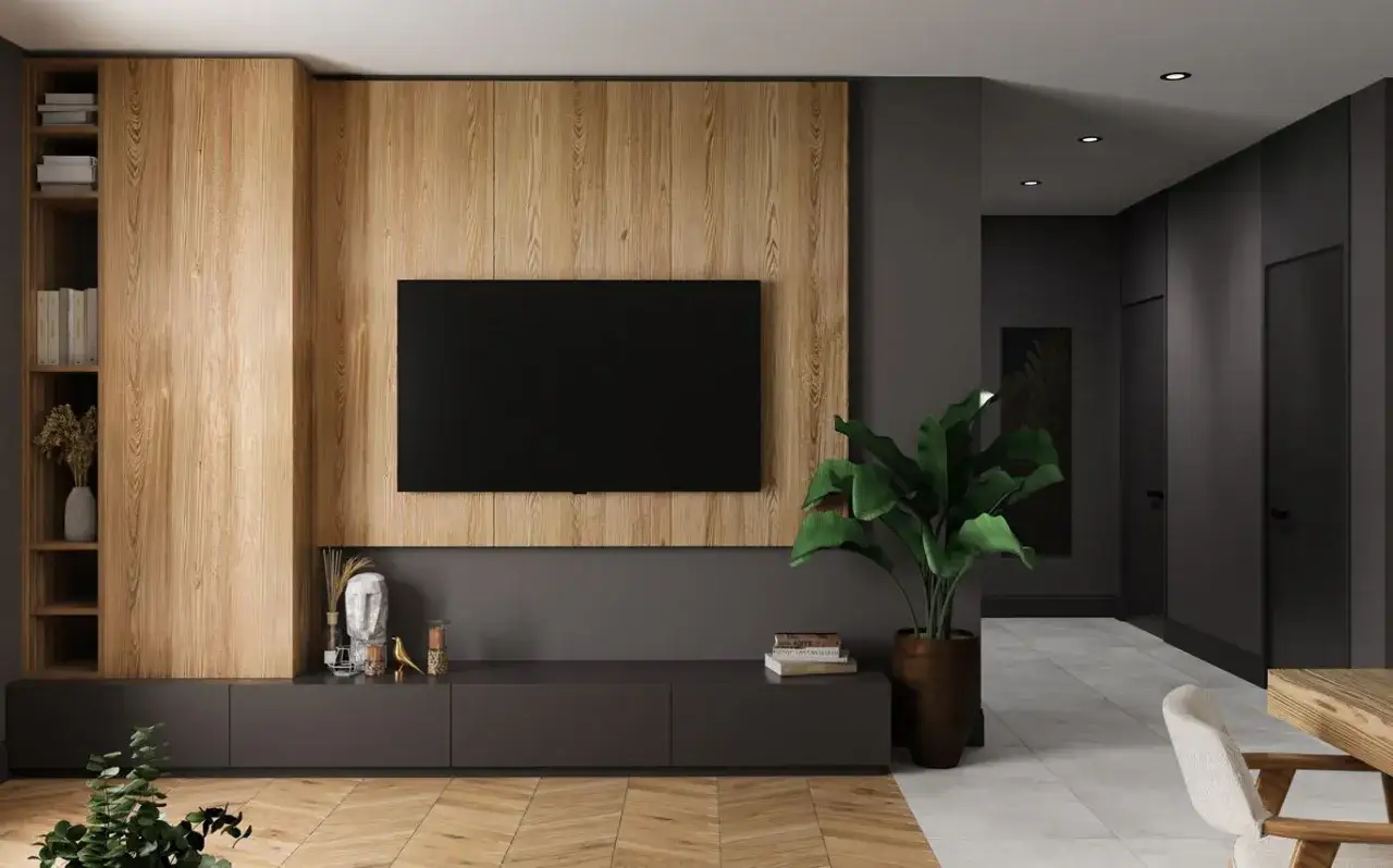 Nowoczesna ściana z telewizorem, drewniane panele, półki z książkami i dekoracje. Inspiracja, jak zrobić ścianę z telewizorem w eleganckim stylu.