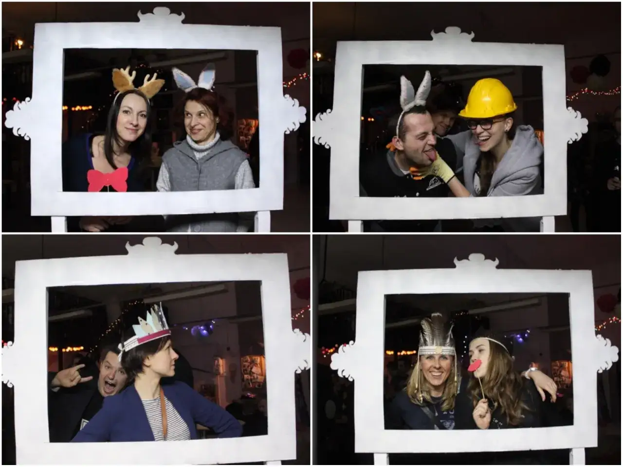 Zabawa z kartonową fotobudką: ludzie w śmiesznych nakryciach głowy pozują do zdjęć.