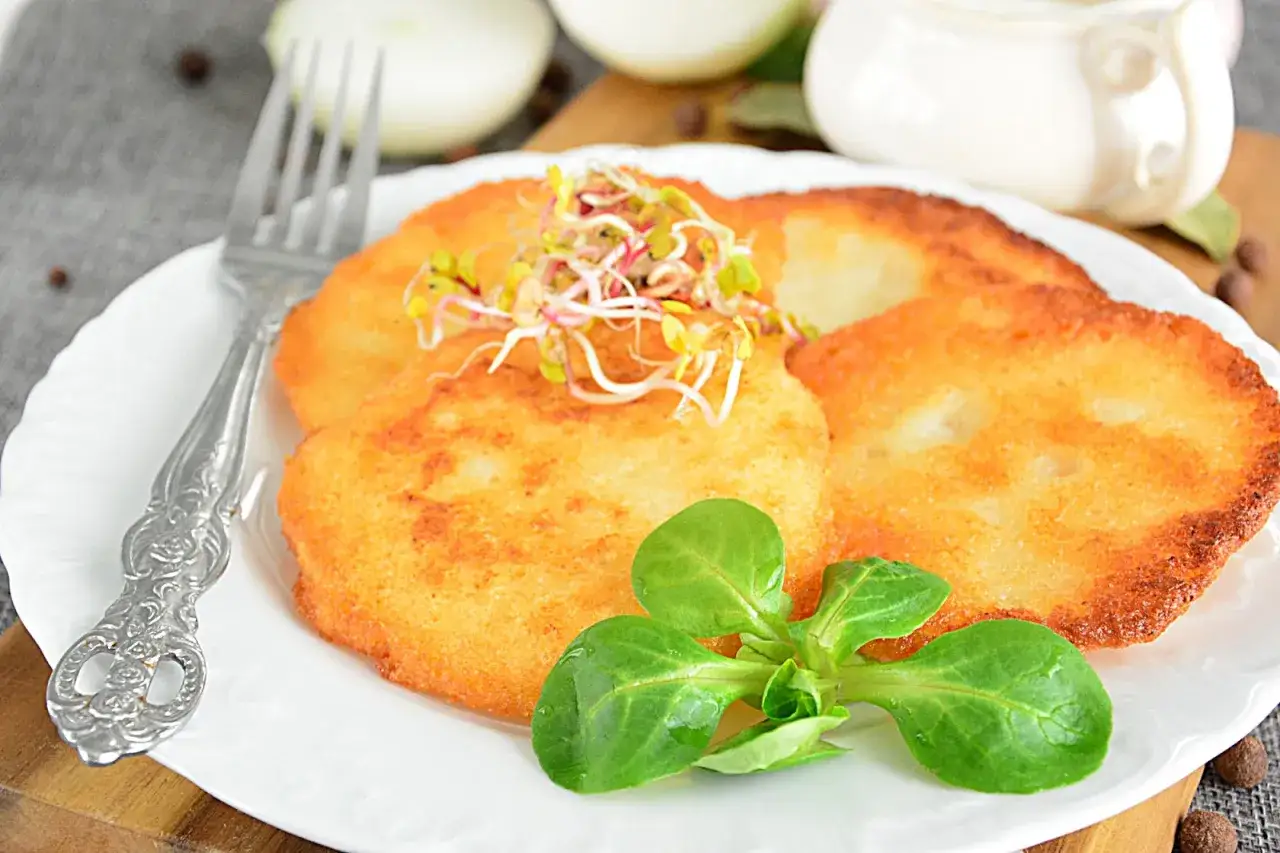 Zdjęcie Pochodzenie placków ziemniaczanych – historia i kulturowe znaczenie