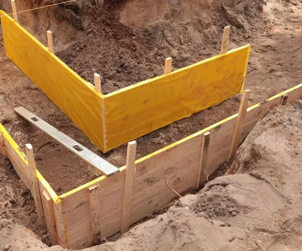 Zdjęcie Jak prawidłowo wykopać dół pod fundament - krok po kroku
