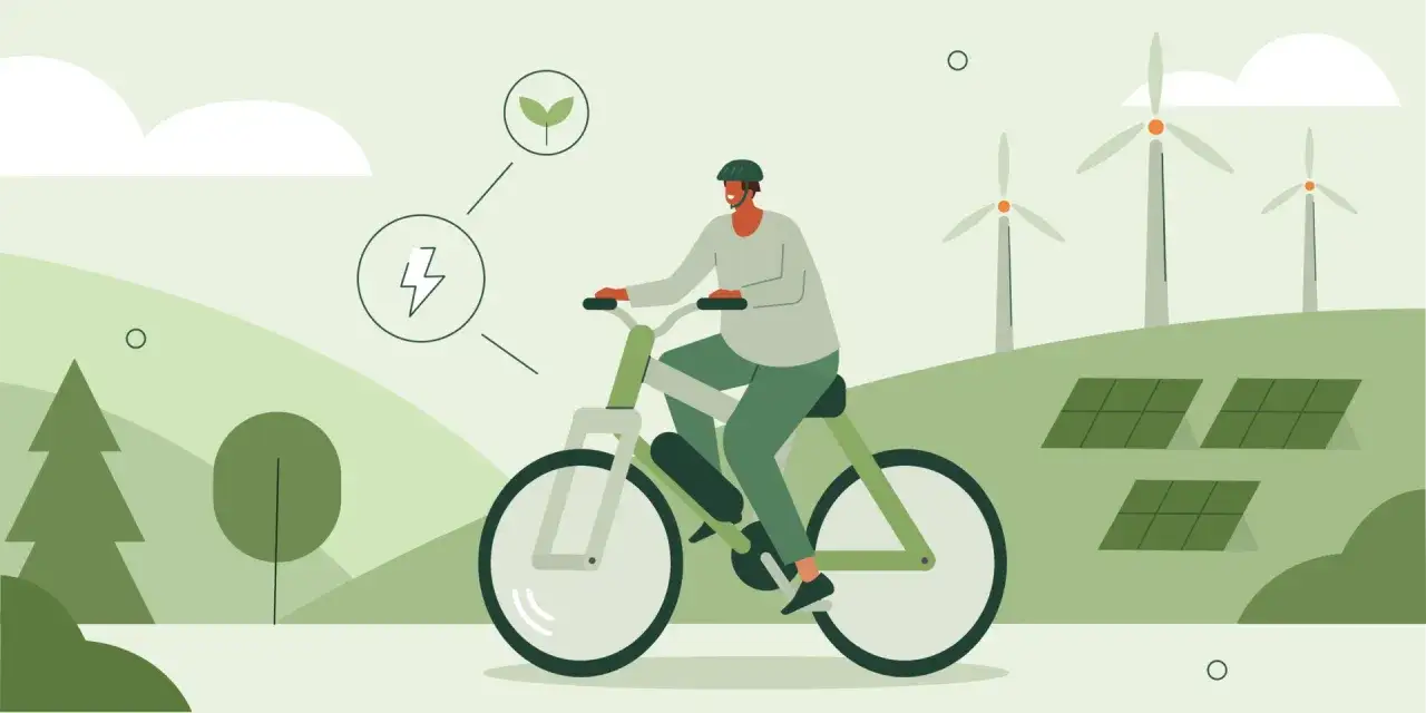 Mężczyzna na rowerze elektrycznym, symbolizującym ekologiczne podróże i duży zasięg. W tle farmy wiatrowe i panele słoneczne.