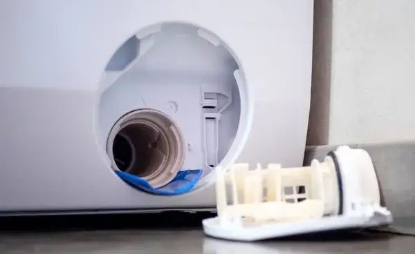 Jak wyczyścić syfon w pralce - prosty sposób na skuteczną konserwację