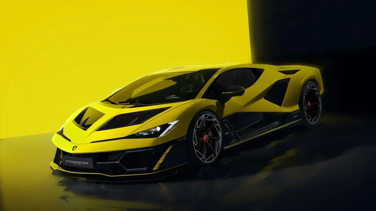 Żółte Lamborghini z czarnymi akcentami na tle żółtej ściany i ciemnego tła.