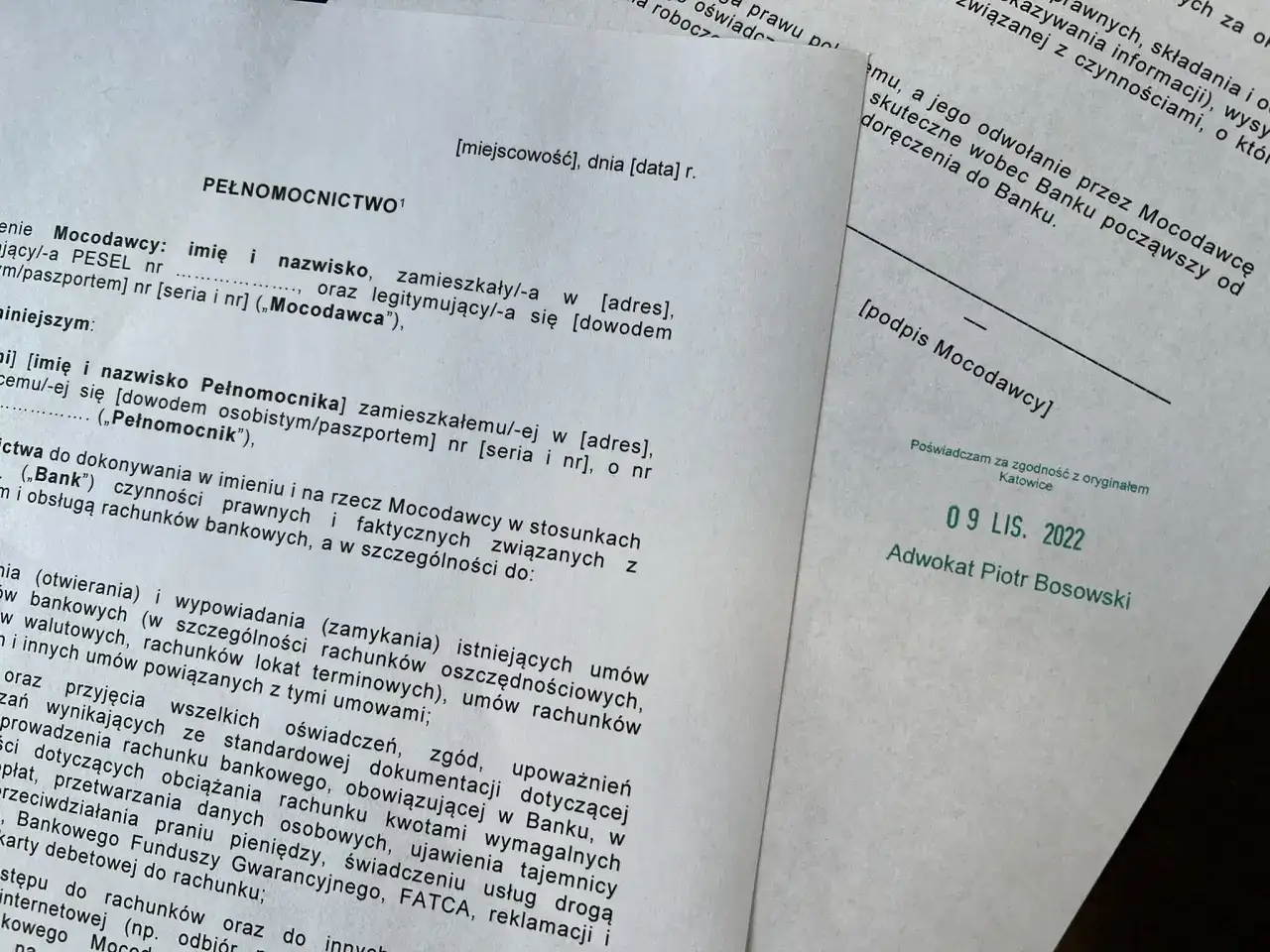 Dokument z pieczątką "Poświadczam za zgodność z oryginałem" i podpisem adwokata Piotra Bosowskiego.