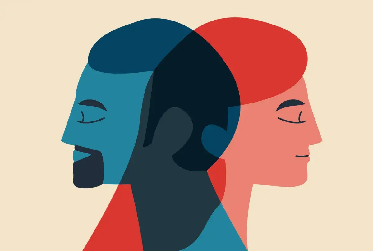 Dwie stylizowane głowy, jedna niebieska, druga czerwona, nakładają się na siebie. Ilustracja symbolizuje, że ile jest płci według LGBT+, tyle odcieni może mieć ludzka tożsamość.