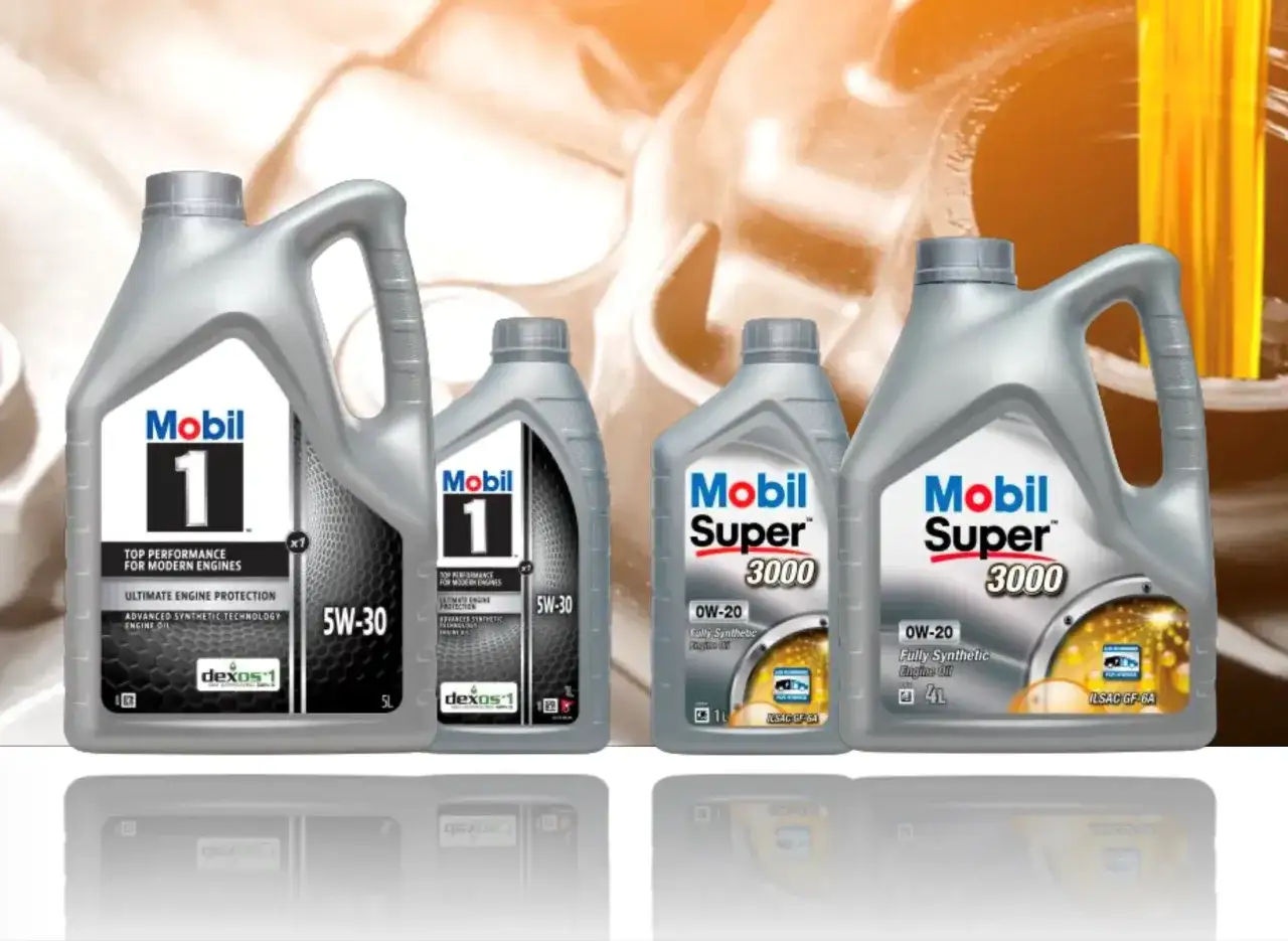 Butelki oleju silnikowego Mobil 1 i Mobil Super 3000 o różnej lepkości.