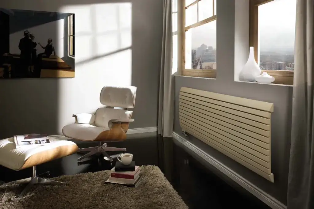 Dlaczego kaloryfery montuje się pod oknem? Odkryj korzyści i zalety