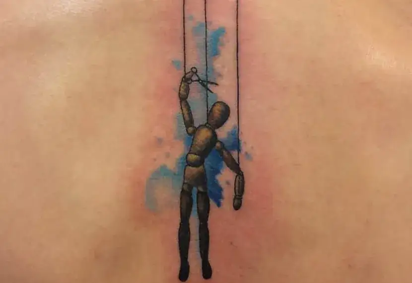 Tatuaż marionetka znaczenie - odkryj jego symbolikę i interpretacje