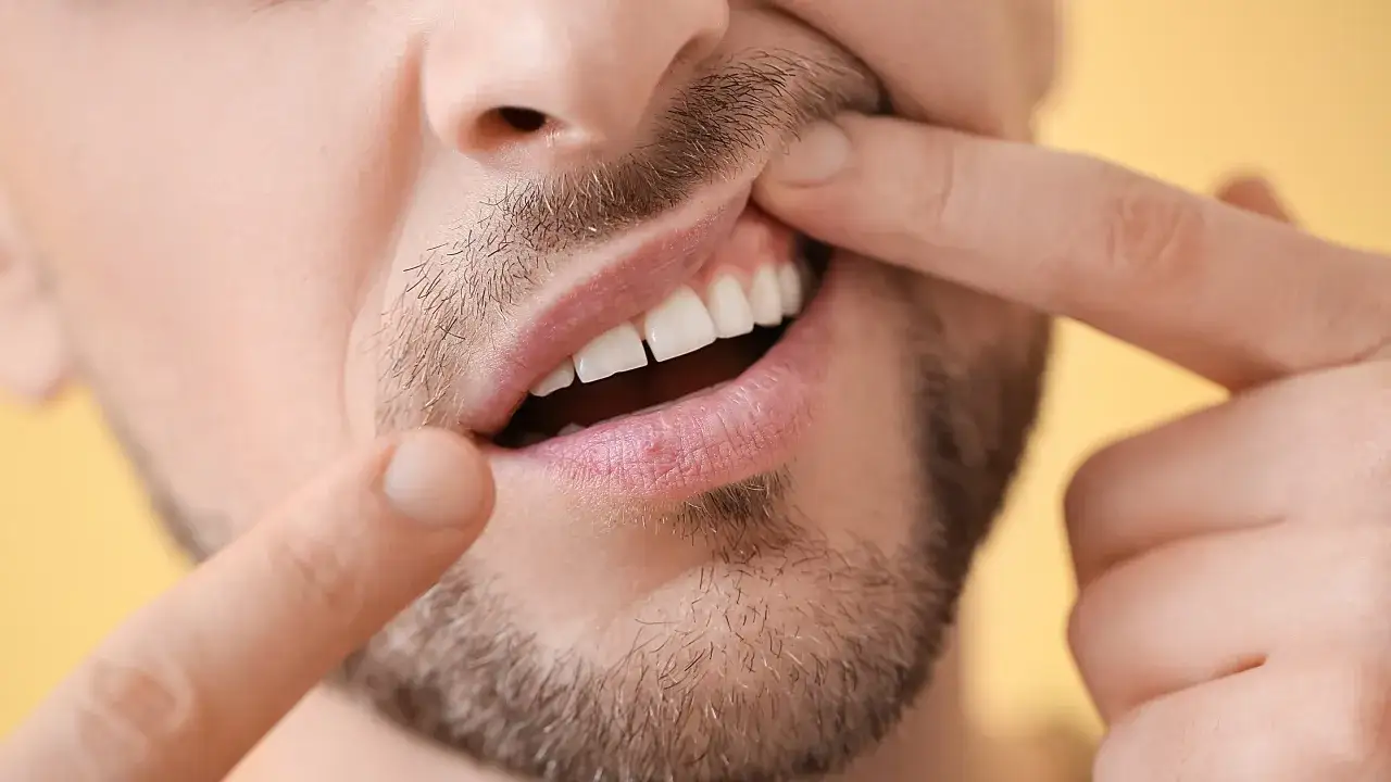 Zakażenie organizmu od zęba objawy – nie bagatelizuj tych sygnałów