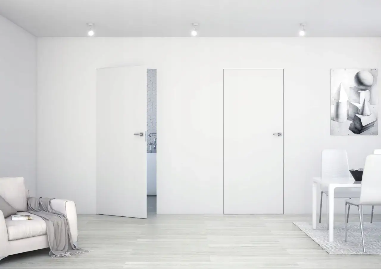 Minimalistyczne wnętrze z drzwiami Sara Eco. Jasna sofa, stół z krzesłami i obraz na ścianie.