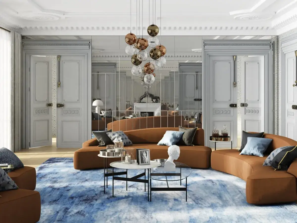 Nowoczesny salon w stylu nowojorskim z brązową sofą, niebieskim dywanem i lustrzaną ścianą.