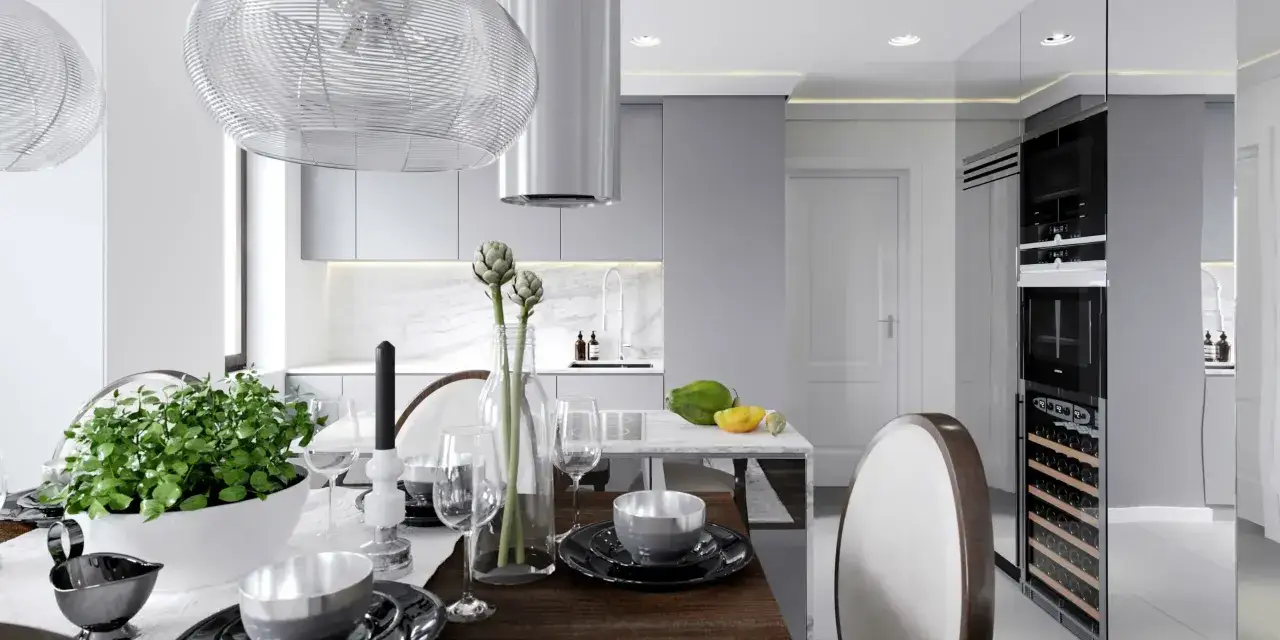 Nowoczesna kuchnia z jadalnią, gdzie subtelne listwy sufitowe led podkreślają elegancję wnętrza.