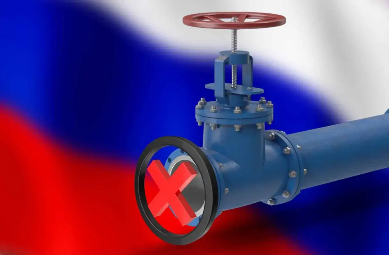 Zawór gazowy z czerwonym krzyżykiem symbolizuje problem z dostawami gazu. Jak zakręcić gaz w domu, gdy brakuje ogrzewania?