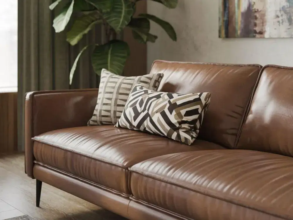 Najlepsze sposoby na eleganckie przykrycie kanapy w salonie - poradnik