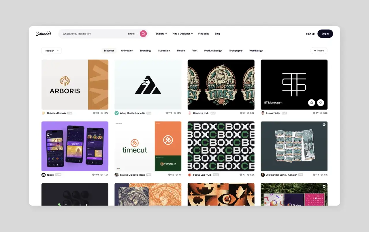 Zrzut ekranu z Dribbble, pokazujący siatkę projektów graficznych, w tym logo, ilustracje i projekty aplikacji.