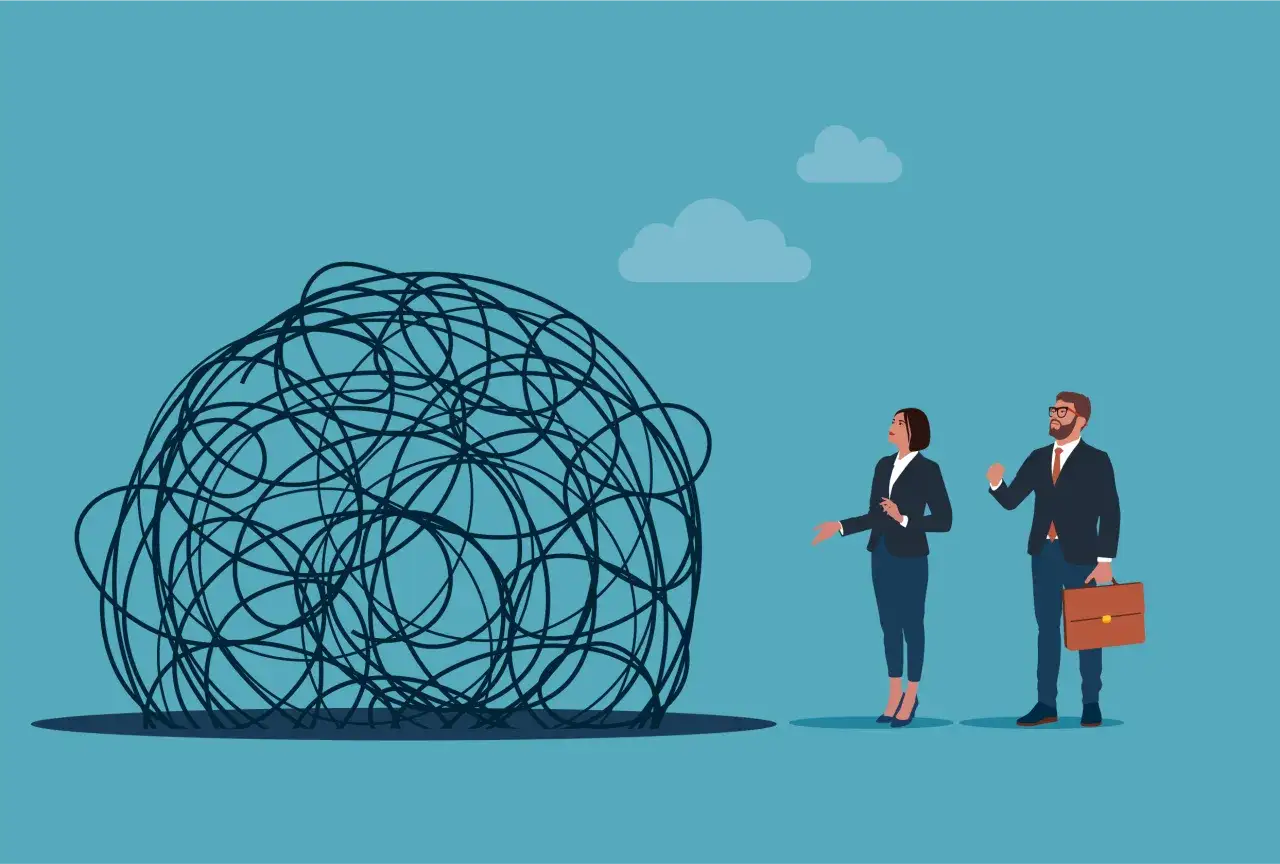 Dwie osoby w garniturach patrzą na wielką, splątaną kulę. Zastanawiają się, jak pomóc osobie chorej psychicznie, która nie chce się leczyć.