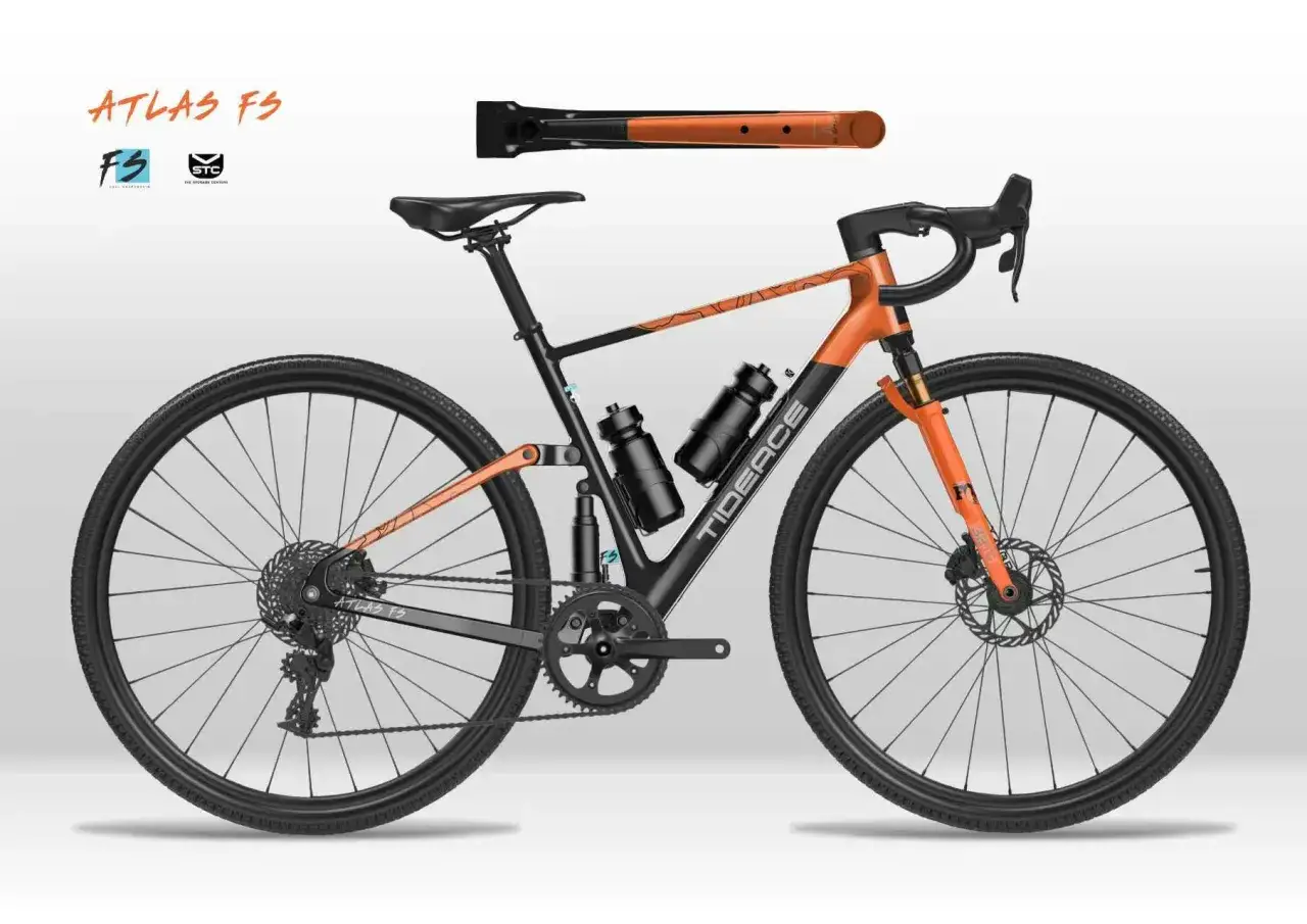 Pomarańczowy gravel z amortyzatorem, gotowy na każdą trasę.