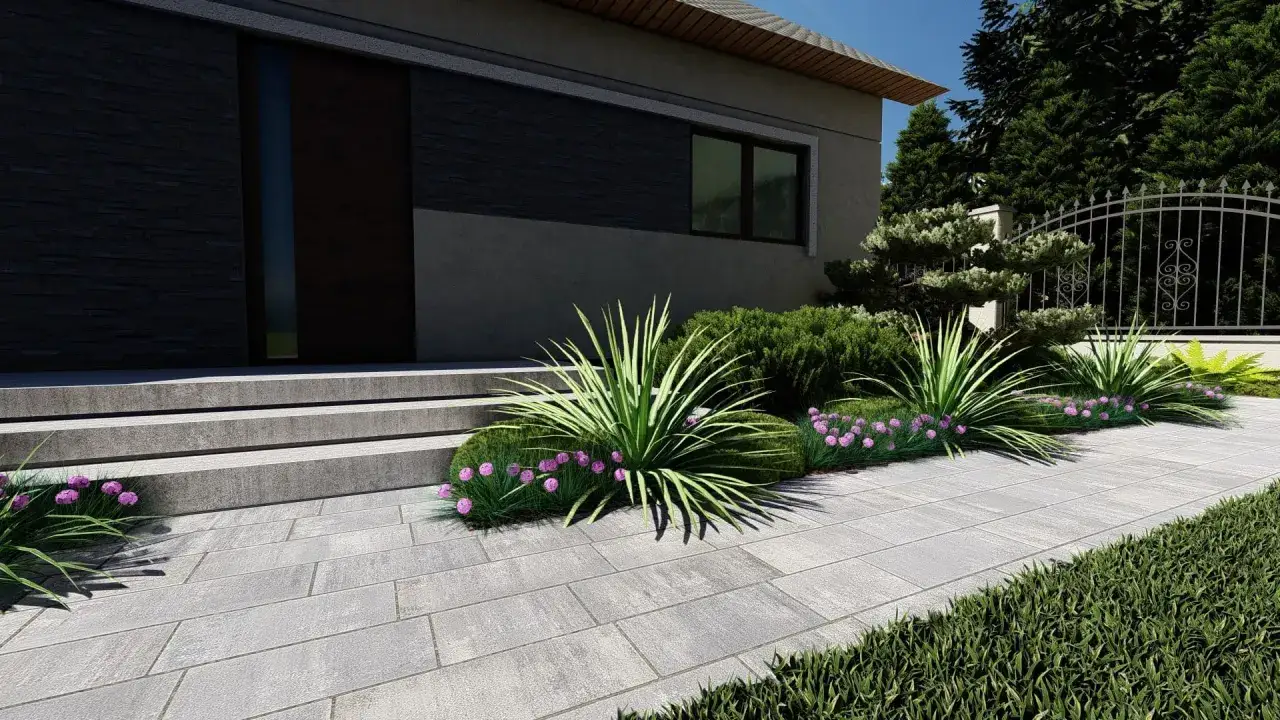 Ozdobne trawy i fioletowe kwiaty świetnie wyglądają, gdy zastanawiasz się, co posadzić przy chodniku do domu.