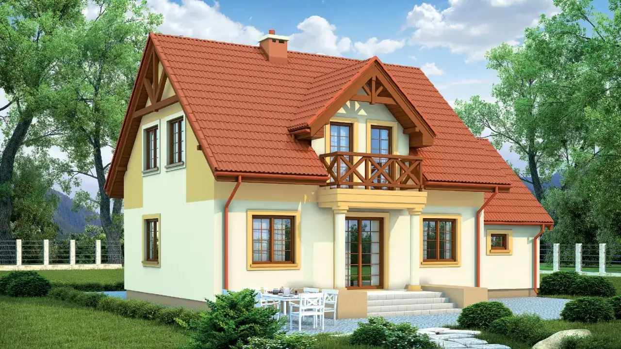 Dom z ceglastym dachem i jasną elewacją, z drewnianym balkonem i tarasem. Otoczony zielenią, z widokiem na góry.