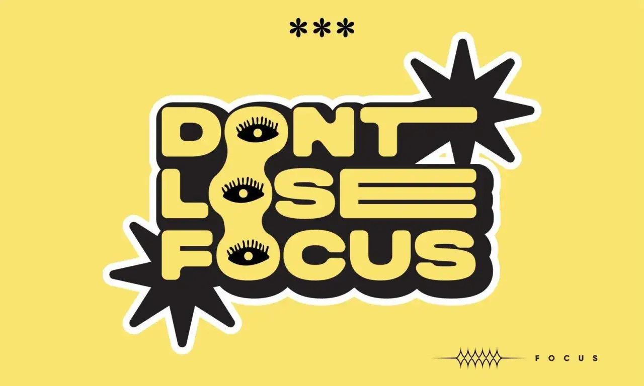 Napis "DON'T LOSE FOCUS" z oczami zamiast litery "O". Unikaj odbieganie od tematu, skup się na celu.