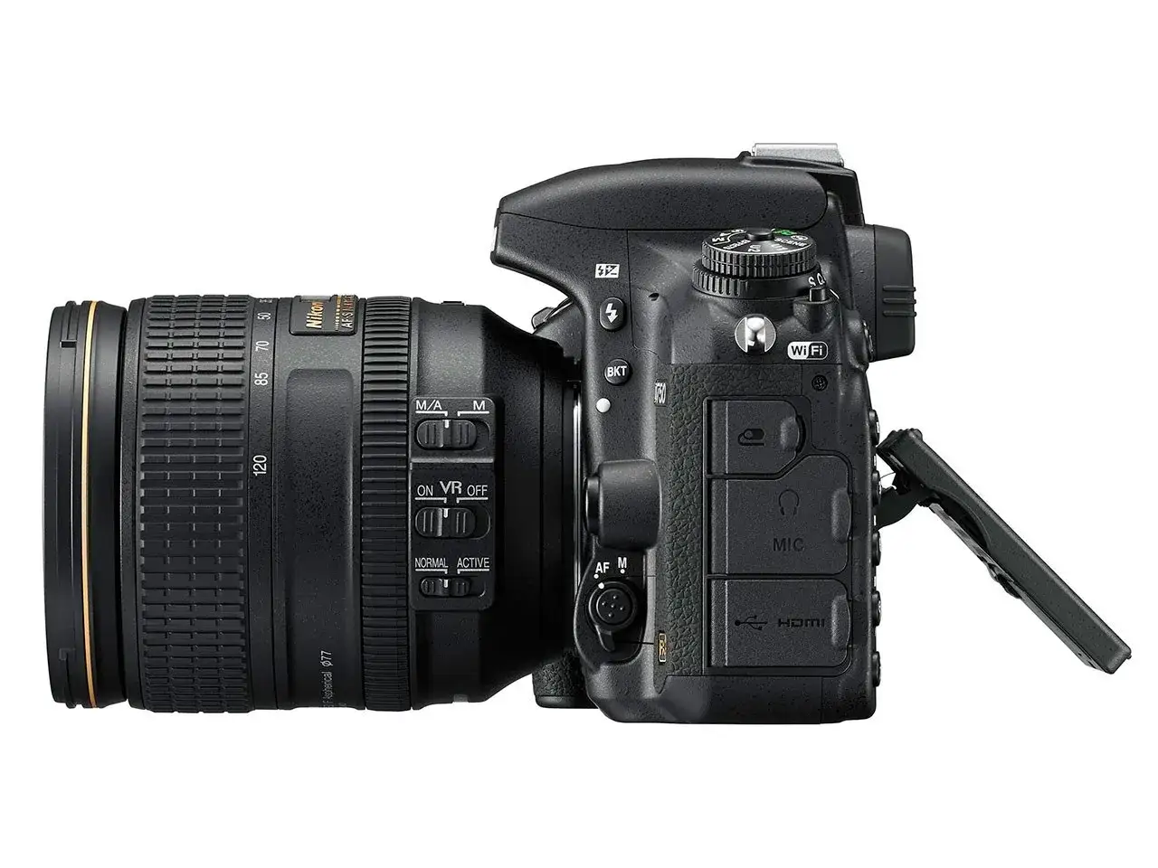 Nikon D750 test: aparat z obiektywem 24-120 mm, widoczne przyciski sterowania, Wi-Fi, HDMI i wejście mikrofonowe.