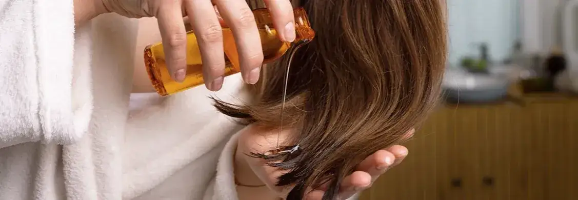 Öl für die Haare: Die besten Öle für gesundes und glänzendes Haar