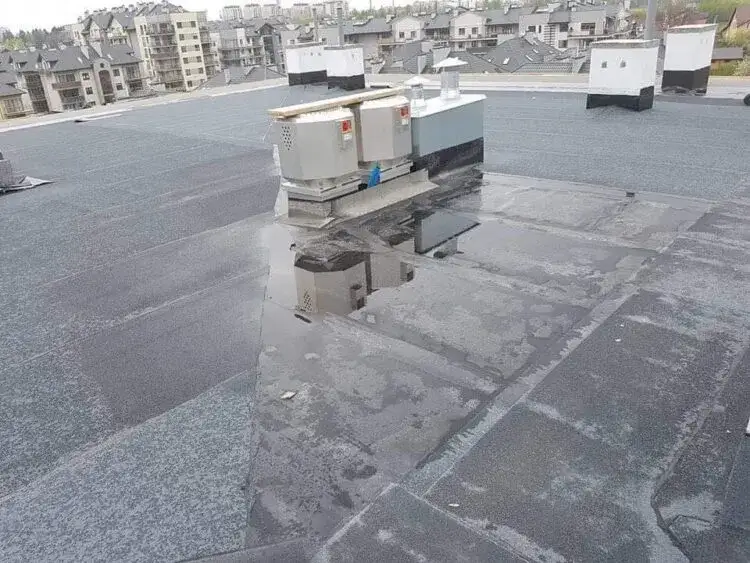 Dach płaski jaki spadek: uniknij problemów z odprowadzaniem wody